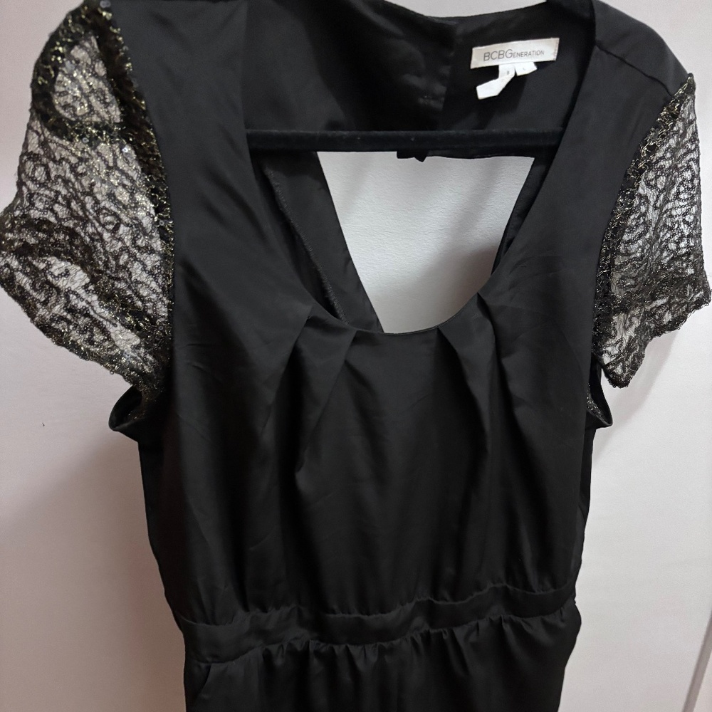 Black romper with lace sleeves